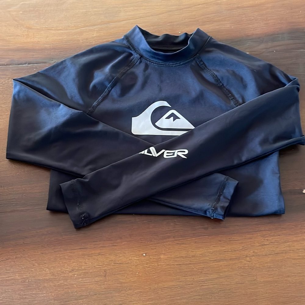 A cool rashguard. Quicksilver brand. In excellent condition.